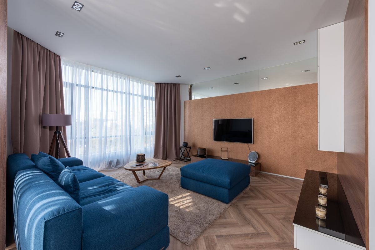 Modern remodeled living space with custom trim and molding details