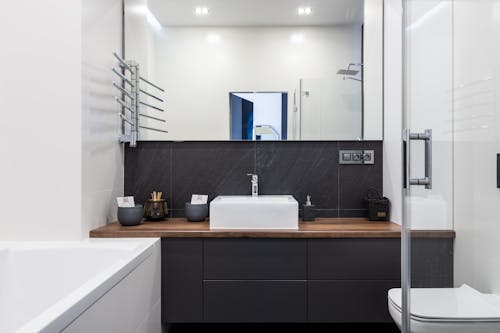 Bathroom with shower and bathtub