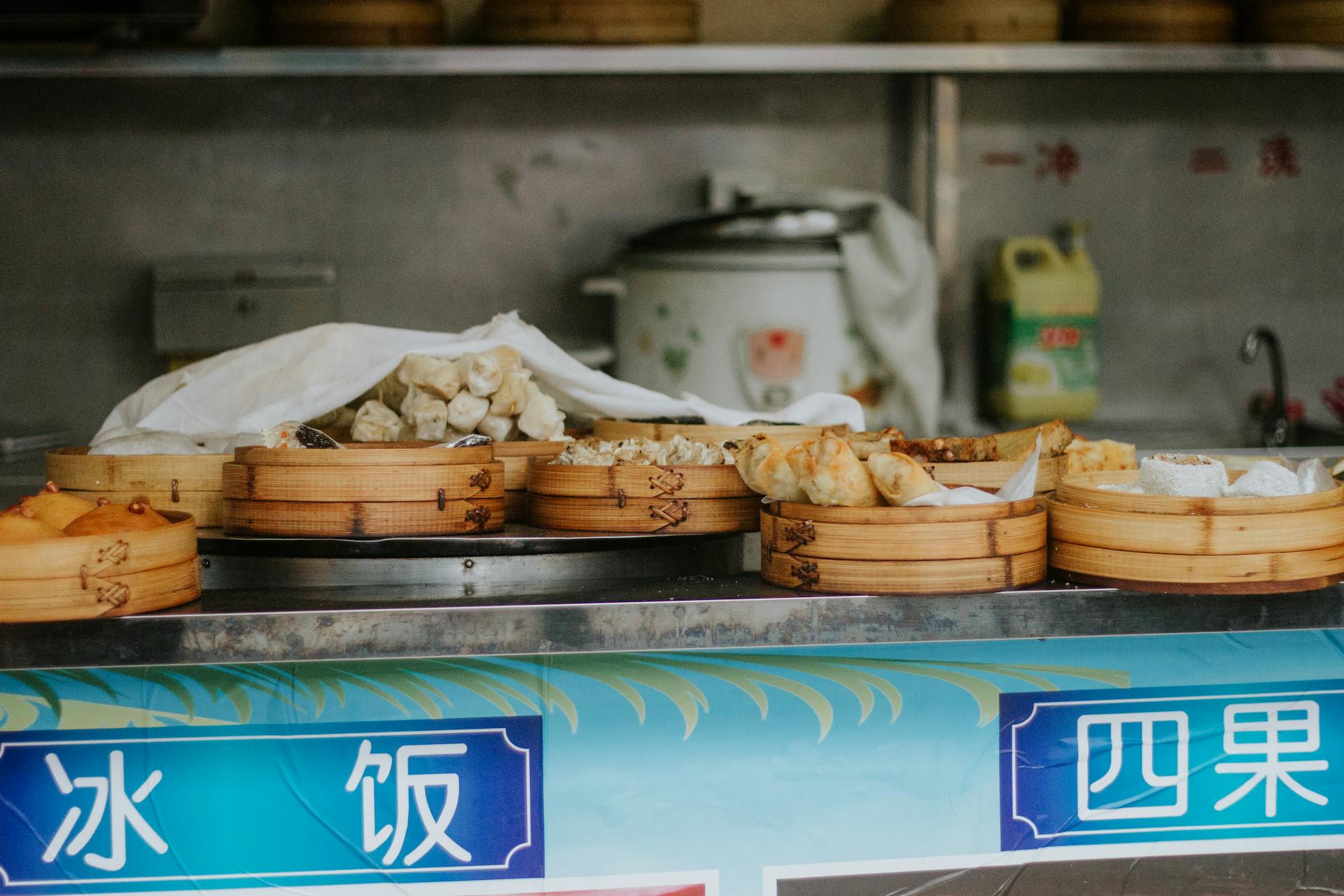 Authentic Chinese street food stall featuring steamed buns in Fuzhou, China.