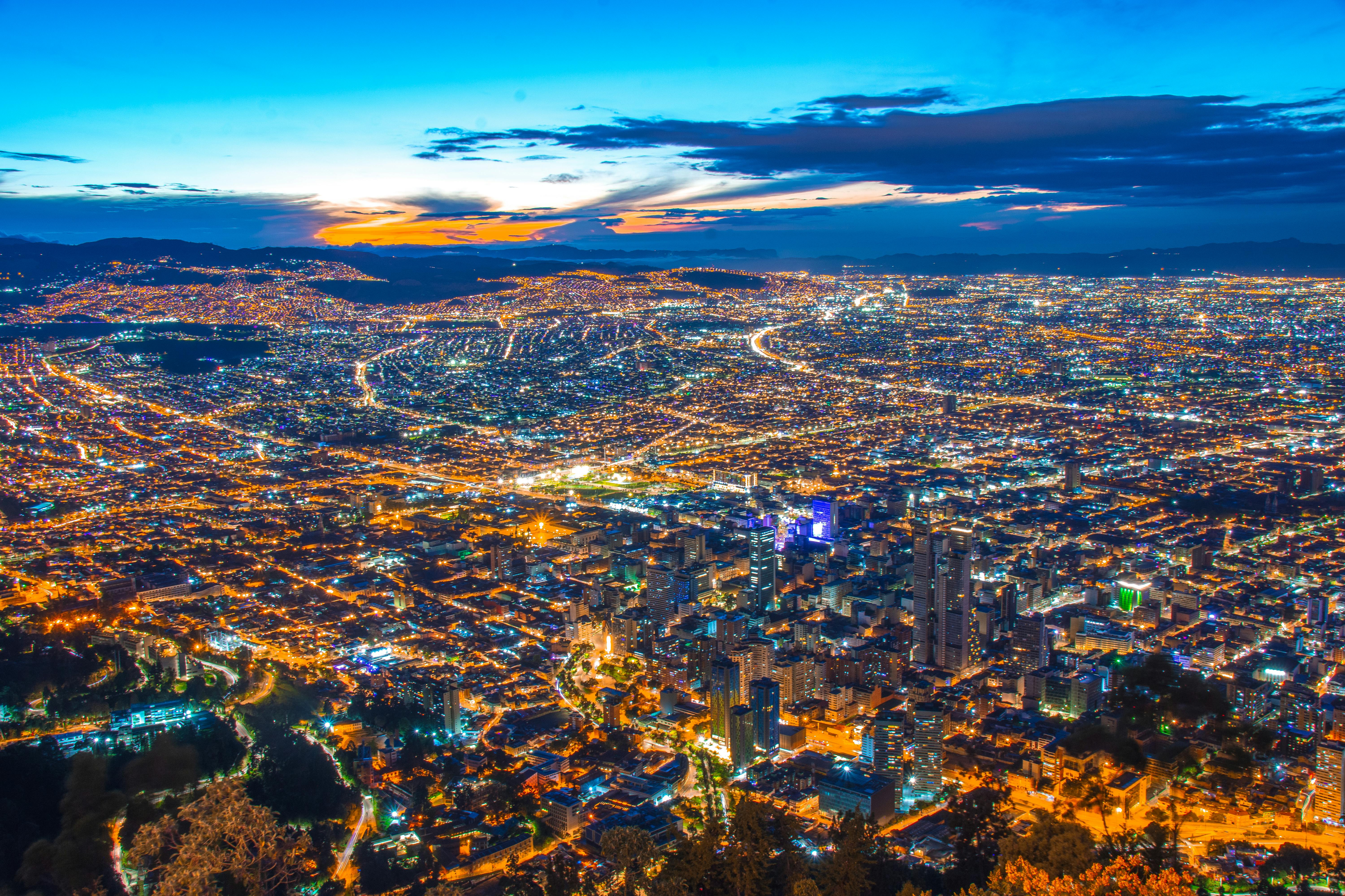 aerial shot of city buildings during twilight