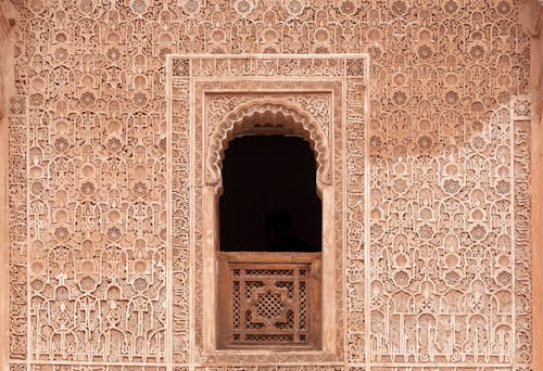 Exterior details of Moroccan palace decorated with arabesque ornaments