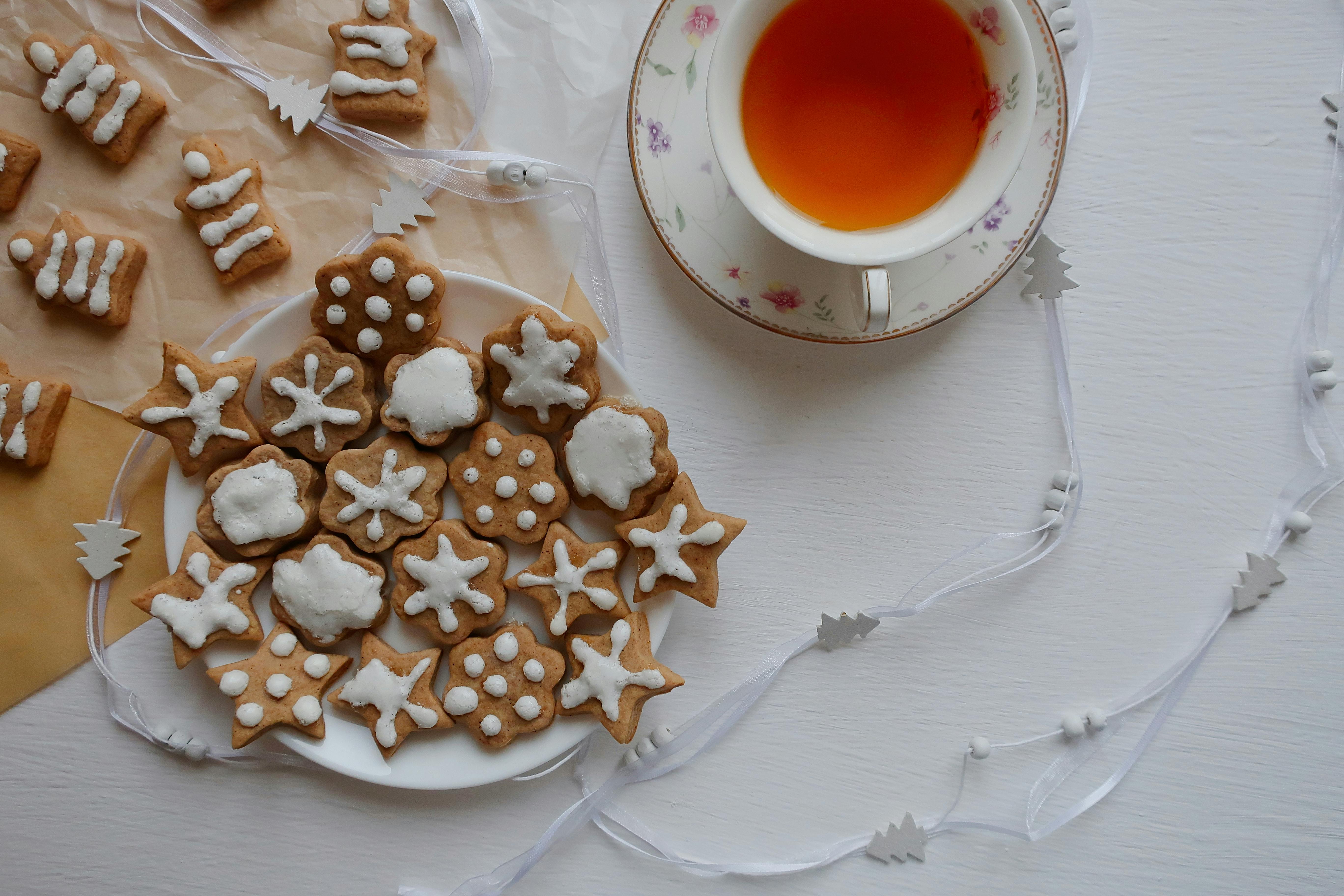 overhead shot of gingerbread cookies and a cup of tea
