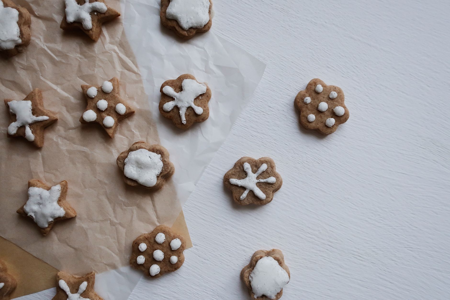 Gingerbread star cookies dipped in white vanilla coating