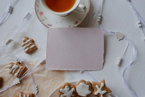 A Blank Card beside a Cup of Tea