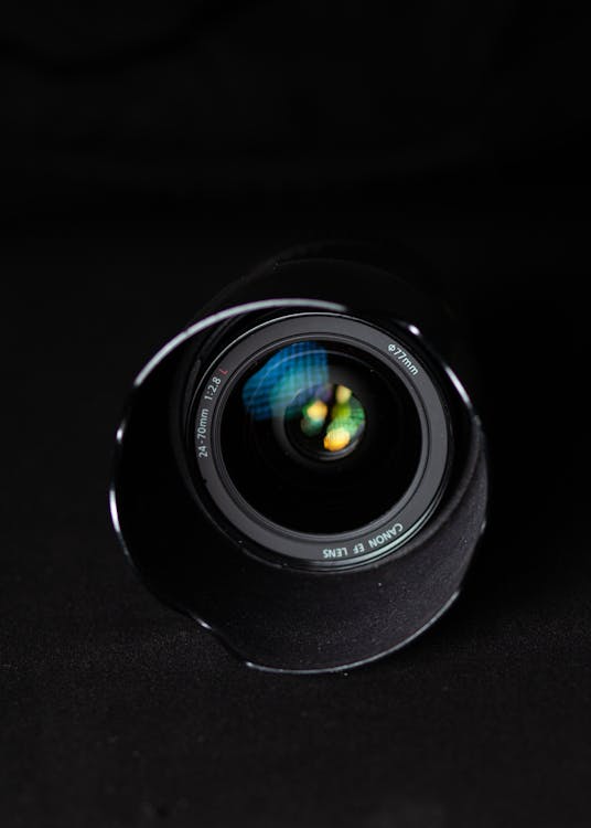 Free Black Camera Lens on Black Surface Stock Photo