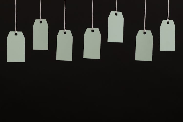 Blank Hang Tags With A Black Background