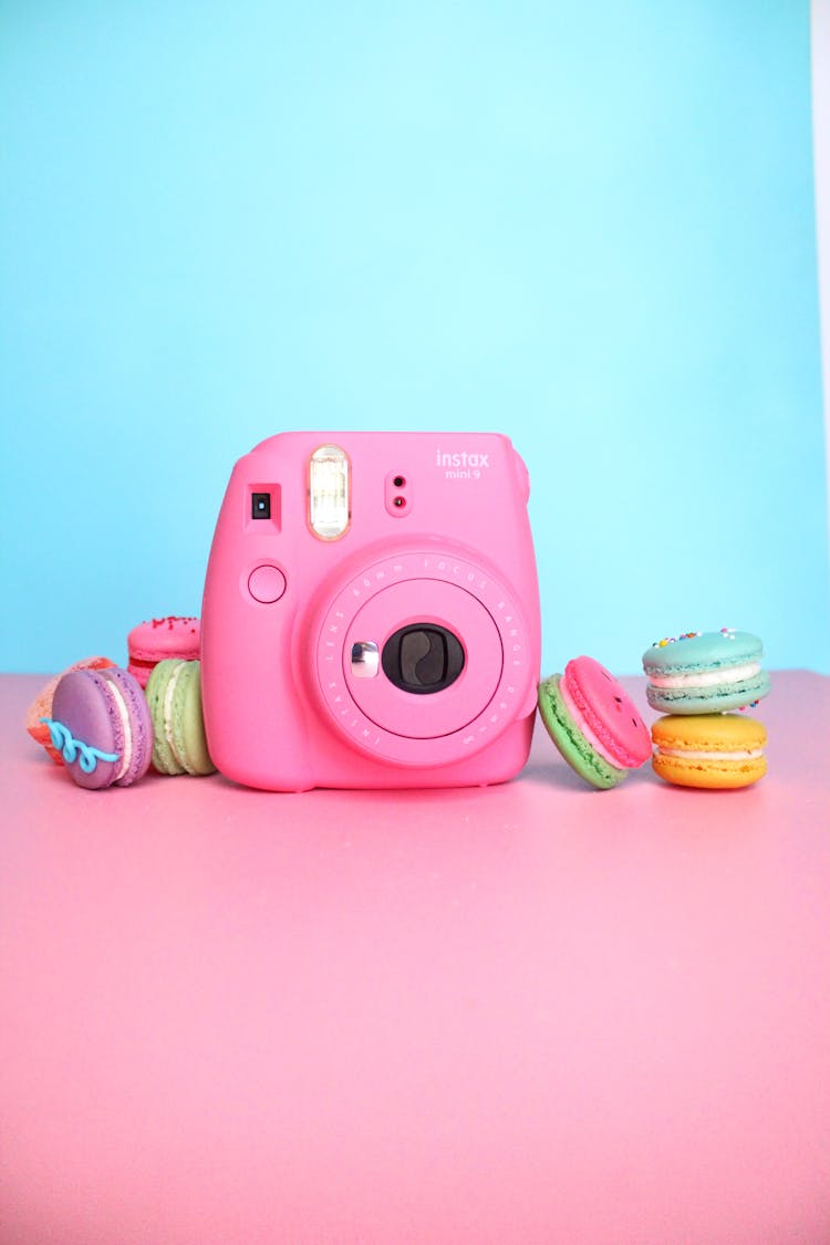 Instax Camera And Sweet Macarons