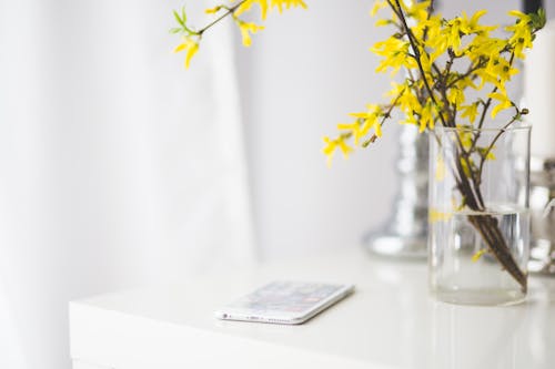 Free iPhone 6 plus on a white desk Stock Photo