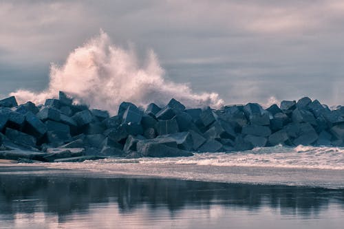 Wall of Rocks on the Beach for Breaking Waves