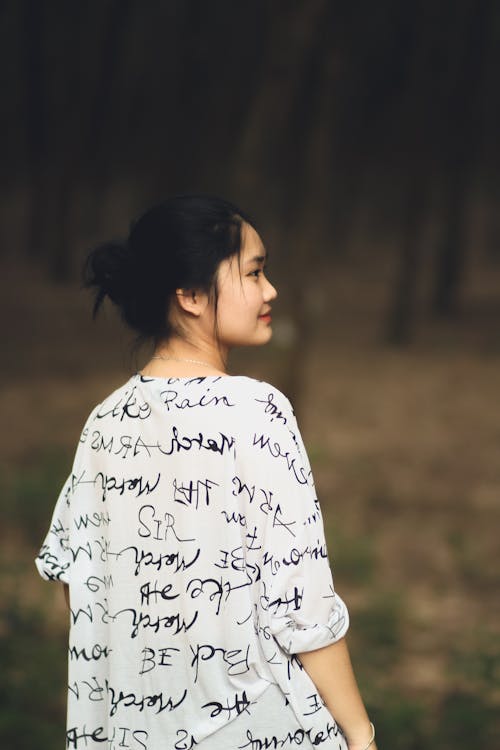 A Woman Posing in a Trendy Outfit