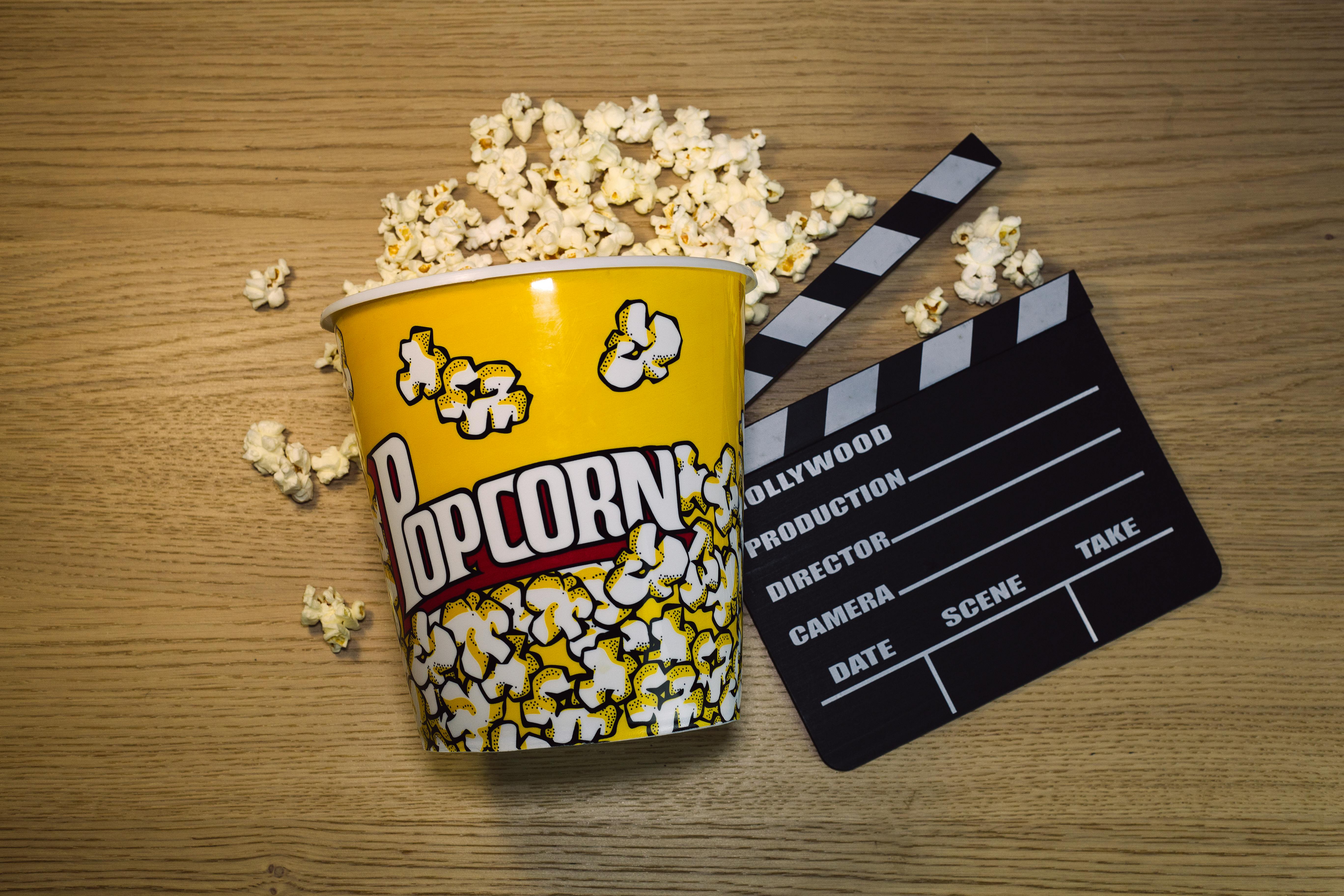 Download Popcorn In Black And Yellow Ceramic Mug Free Stock Photo