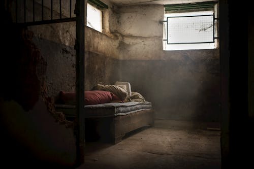 Free Abandoned Building Room with Bed Stock Photo