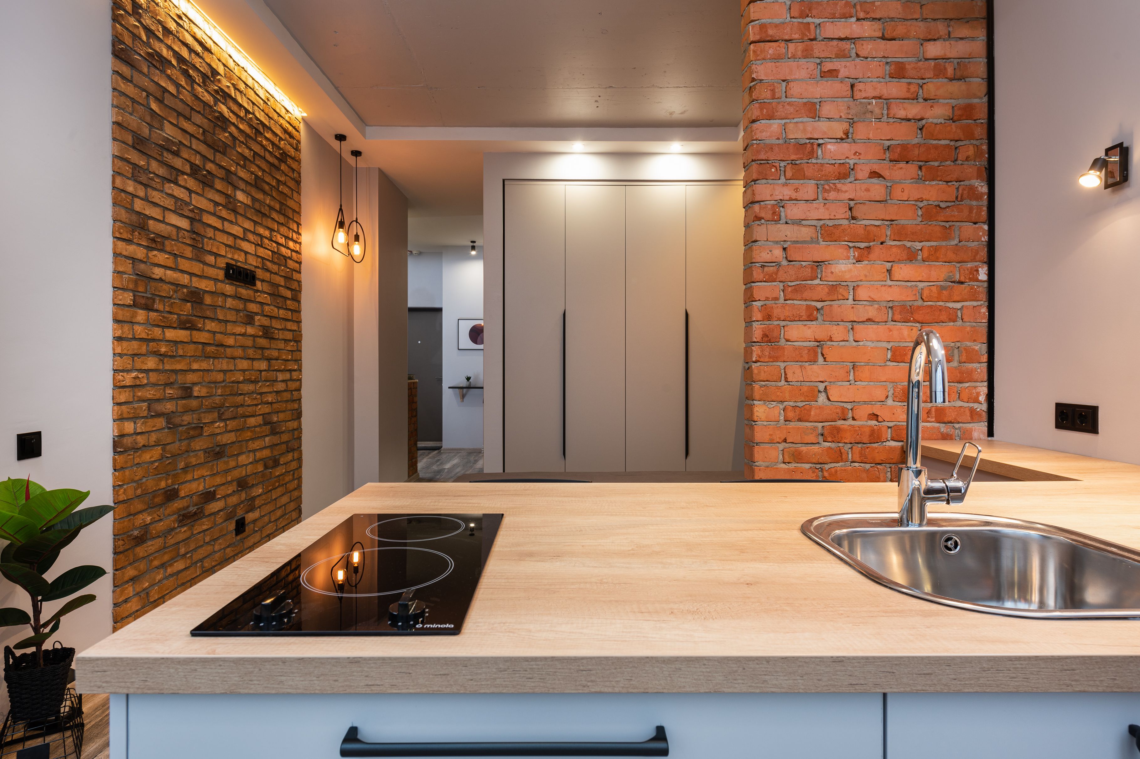 Interior modern apartment with kitchen and bedroom · Free Stock Photo