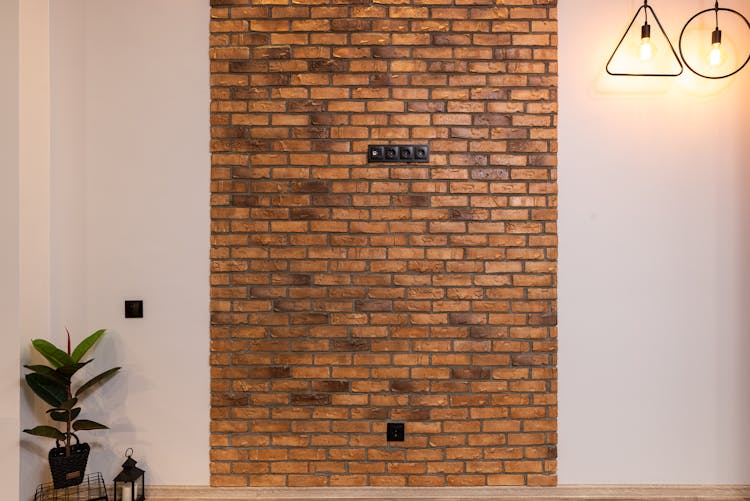 Interior Of Modern Apartment With Brick Wall