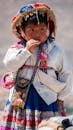 Vertical Photo of a Child in Traditional Clothing