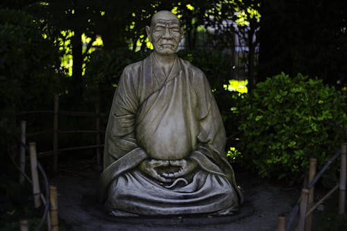 Statue of a Man in Meditating Position