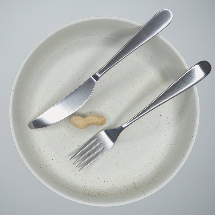 Peanut On White Ceramic Plate 