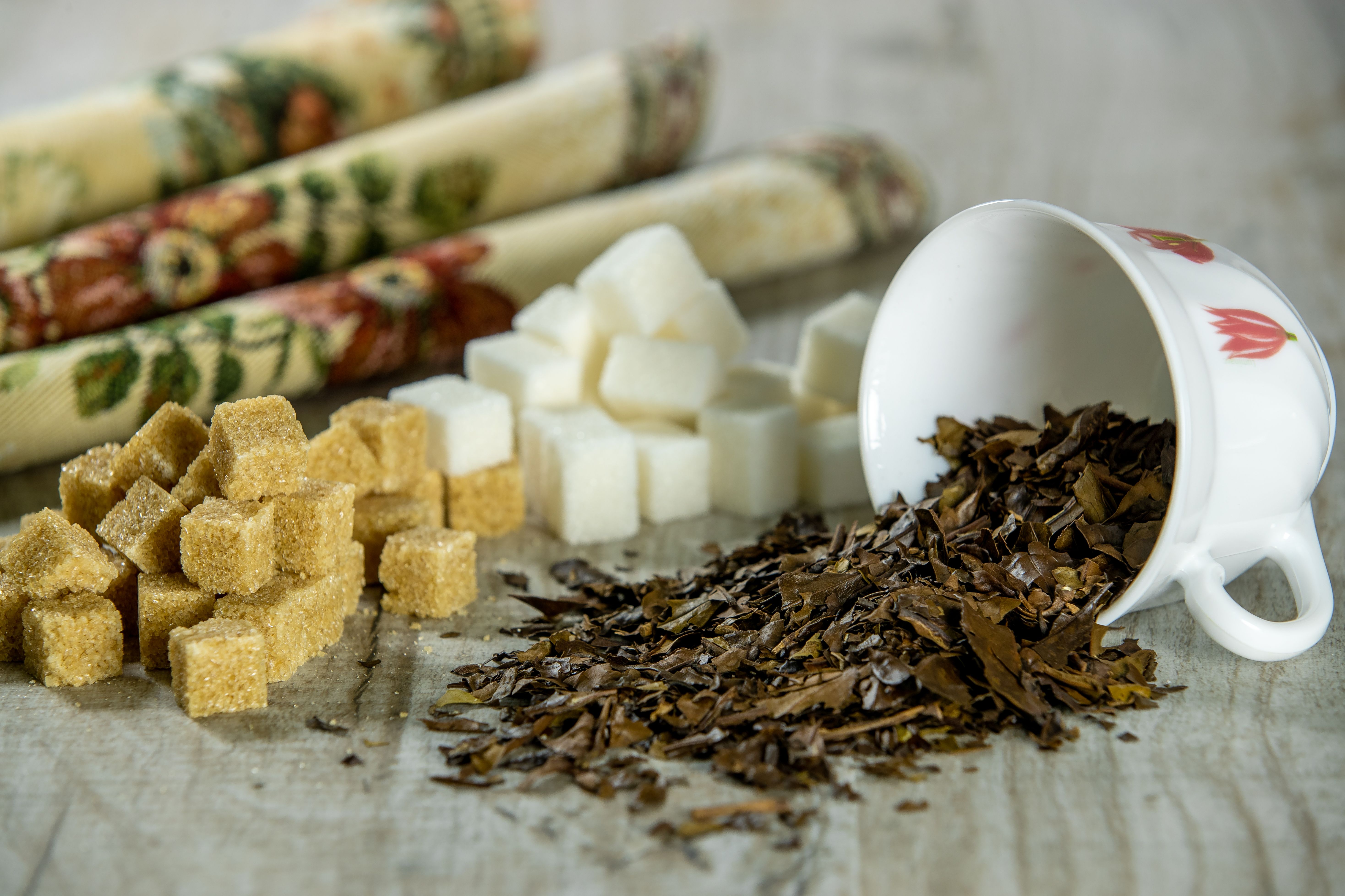 Assorted premium loose leaf teas in ceramic bowls
