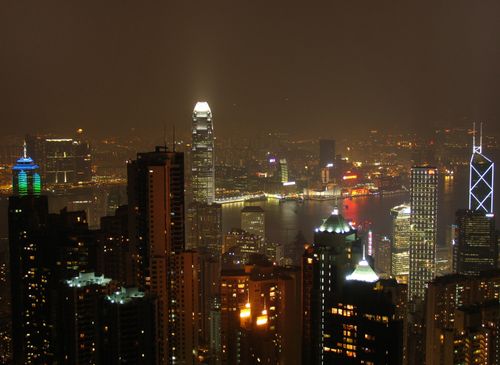 Free Captivating nighttime view of Hong Kong's vibrant skyline overlooking Victoria Harbour. Stock Photo