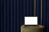 Modern laptop placed on seat for work