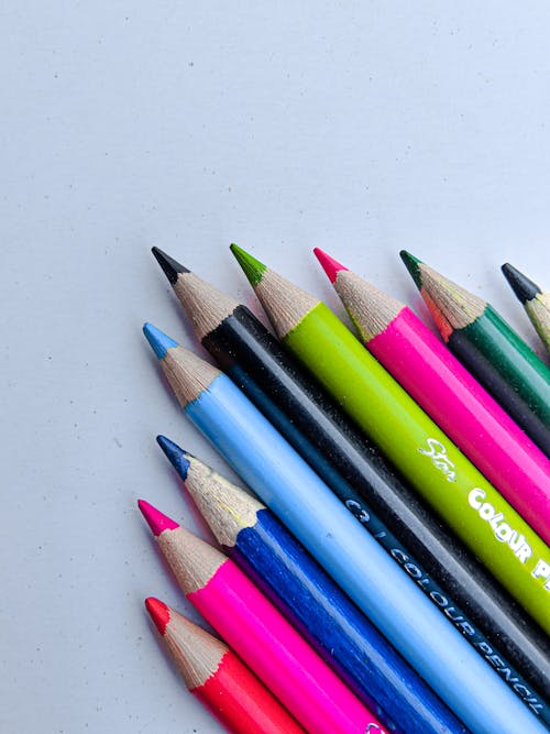 Macro Shot of Color Pencils on a White Surface