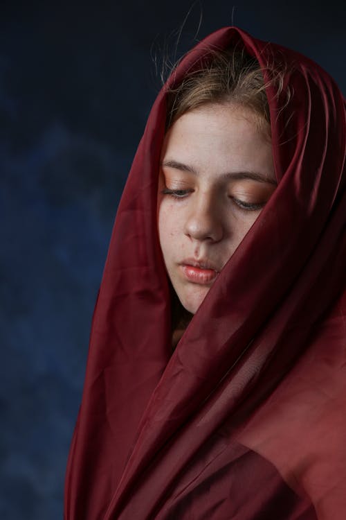Close-Up Shot of a Woman with Red Hijab