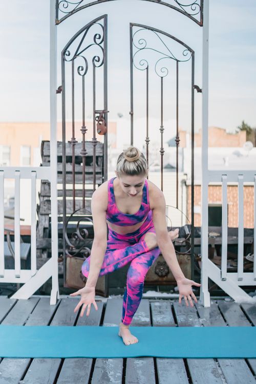 Figure Four Posturing Woman practicing meditation in Figure Four posture · Free Stock Photo