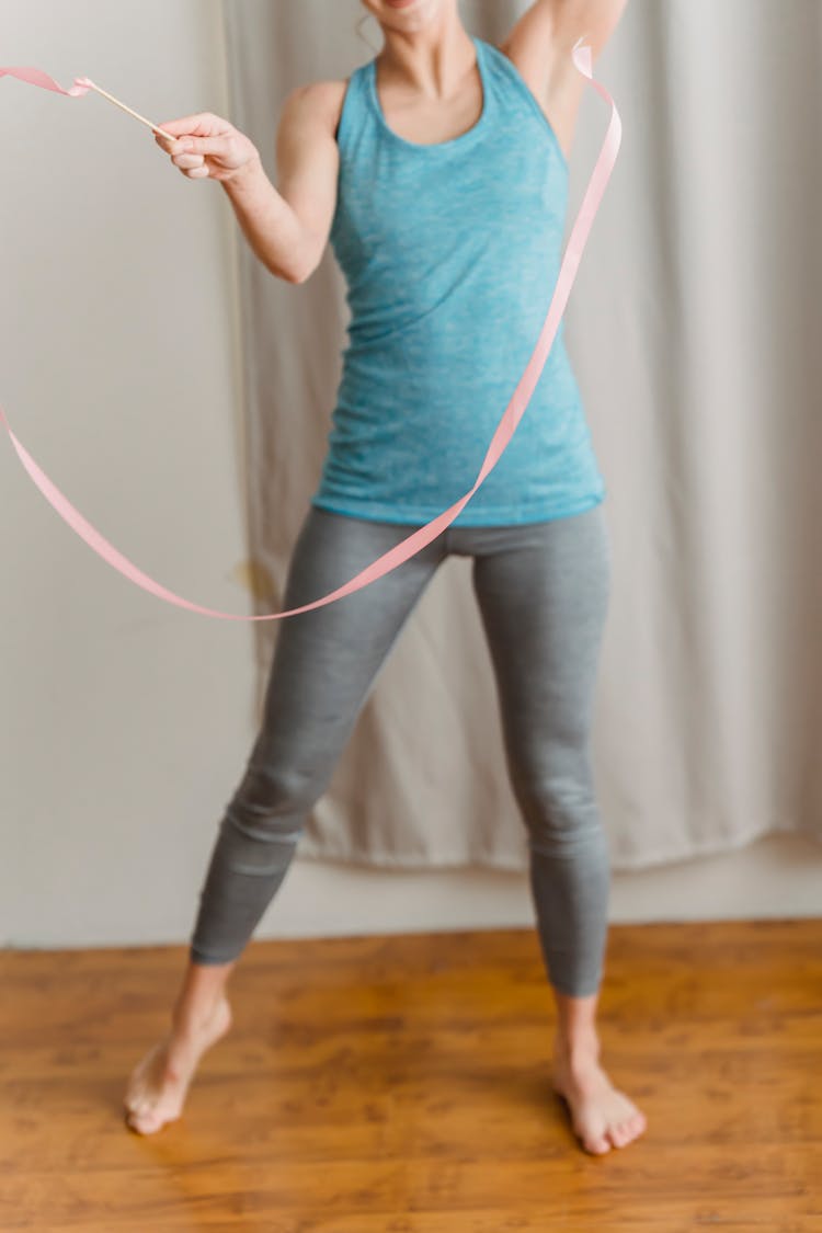 Sportive Woman Exercising With Gymnastic Ribbon