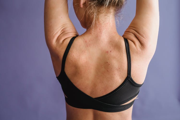 Woman With Strong Back In Sportive Bra