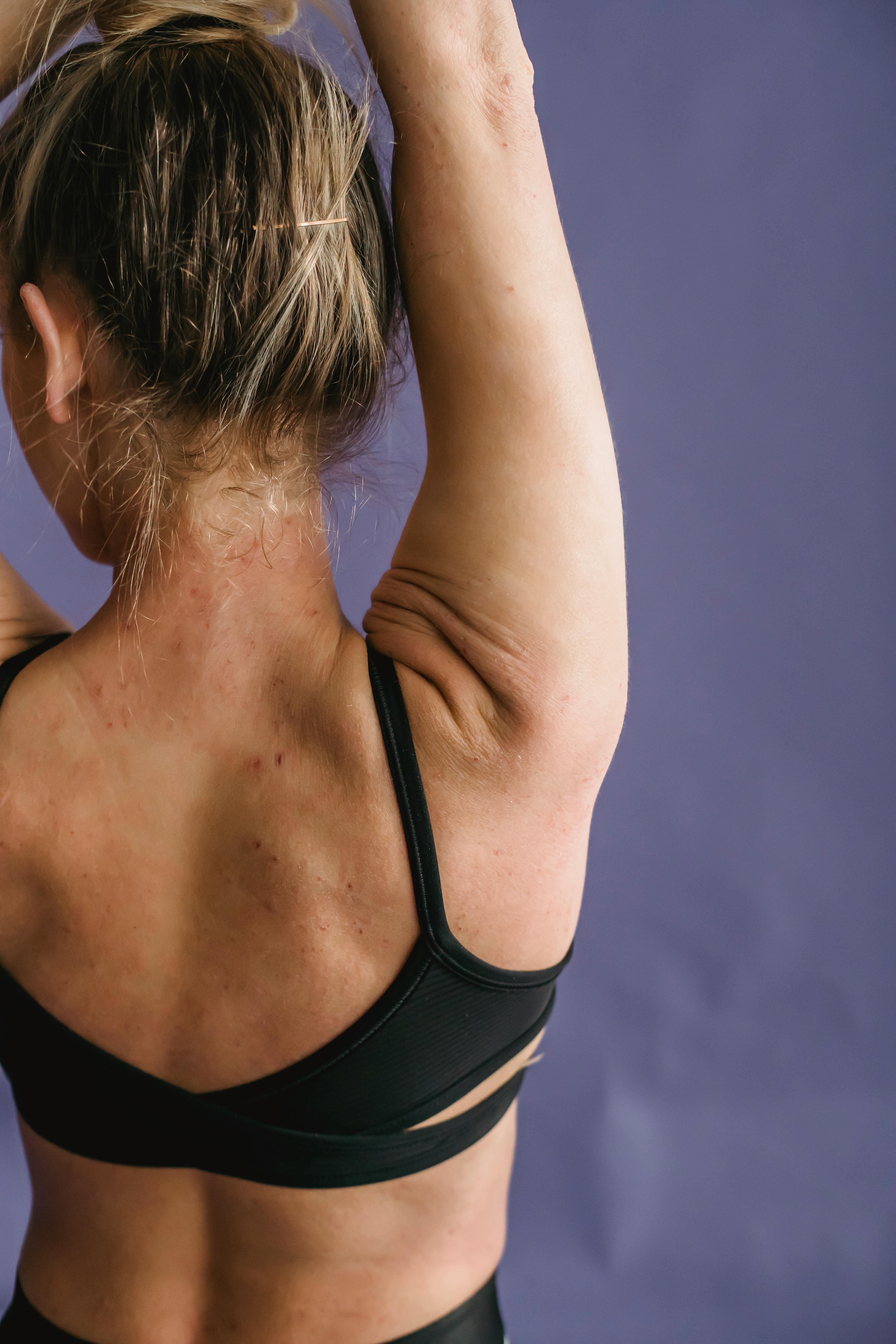 graceful fit woman demonstrating strong back