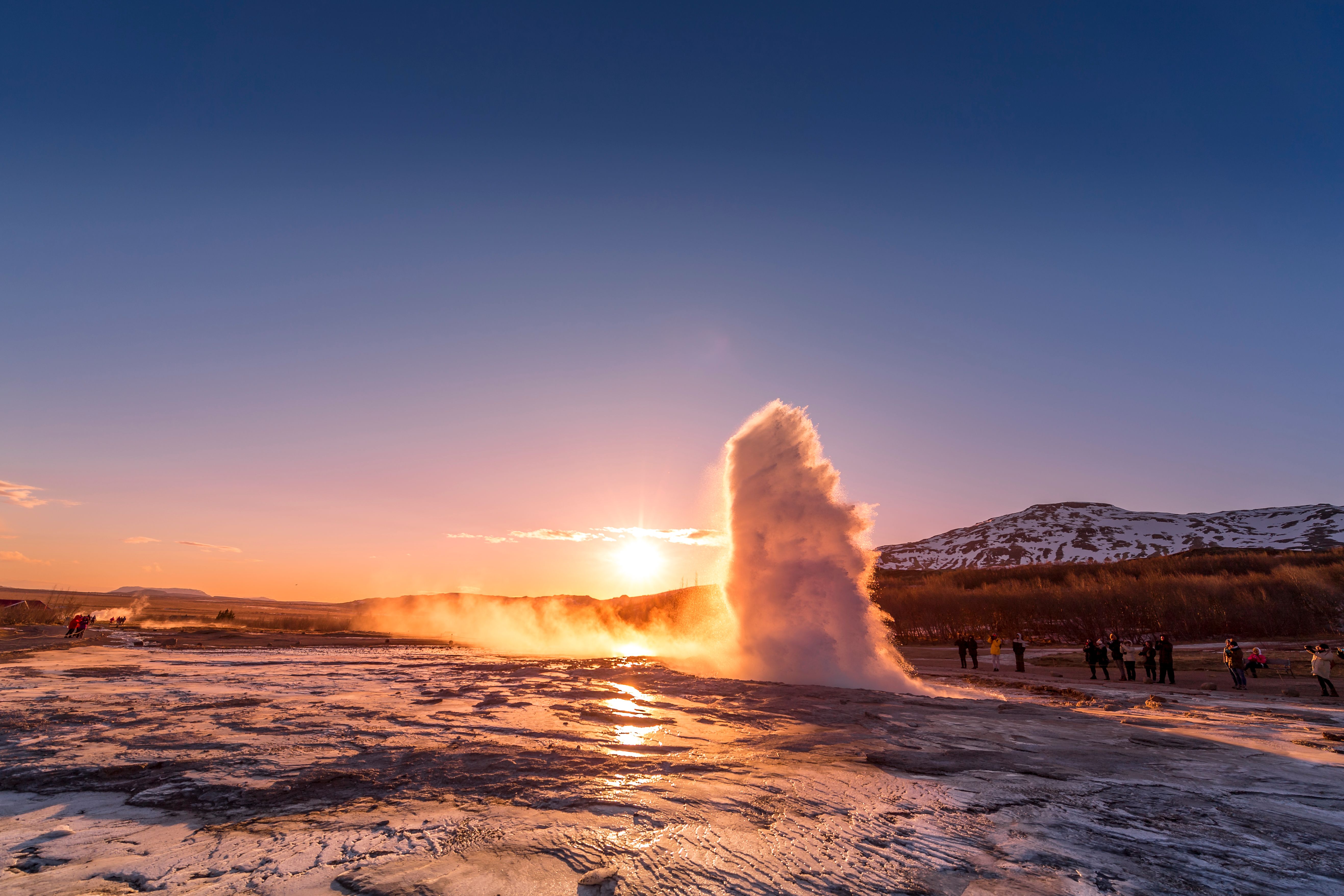 Strokkur geyser erupting a column of hot water