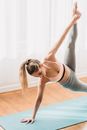 Woman in Plank Extended Side pose