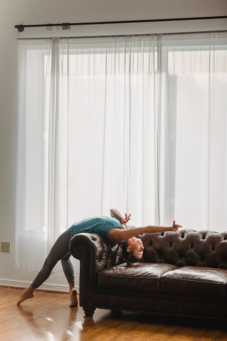 Feminine Young Lady Dancing Gracefully At Home