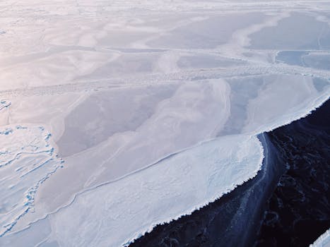 Stunning aerial view of the frozen sea near Vladivostok, showcasing winter's icy grip.