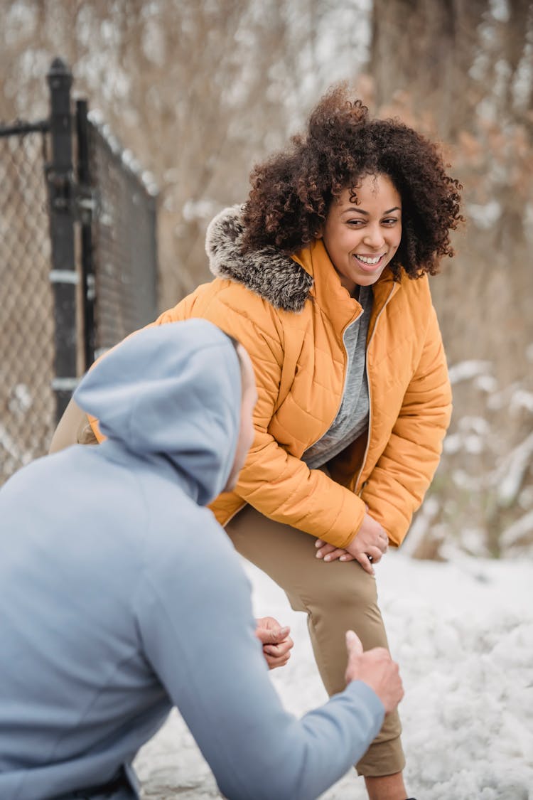 Professional Coach Encouraging Black Woman In Doing Lunges