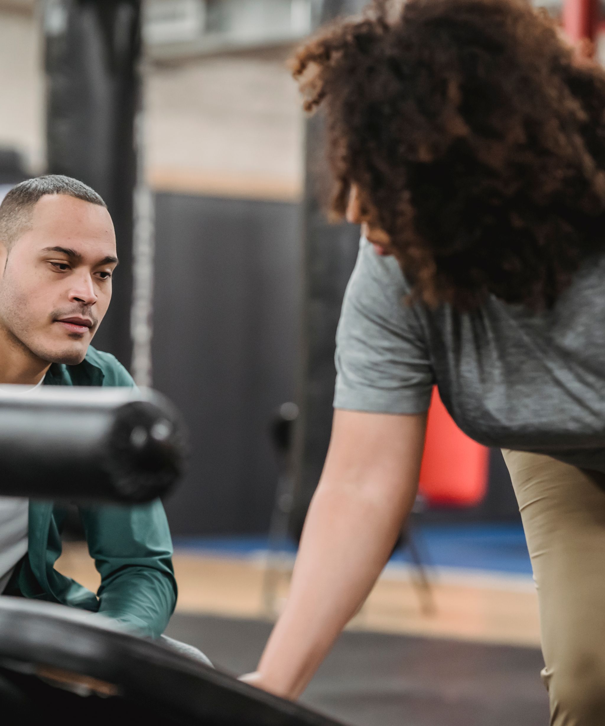 Personal trainer coaching a client