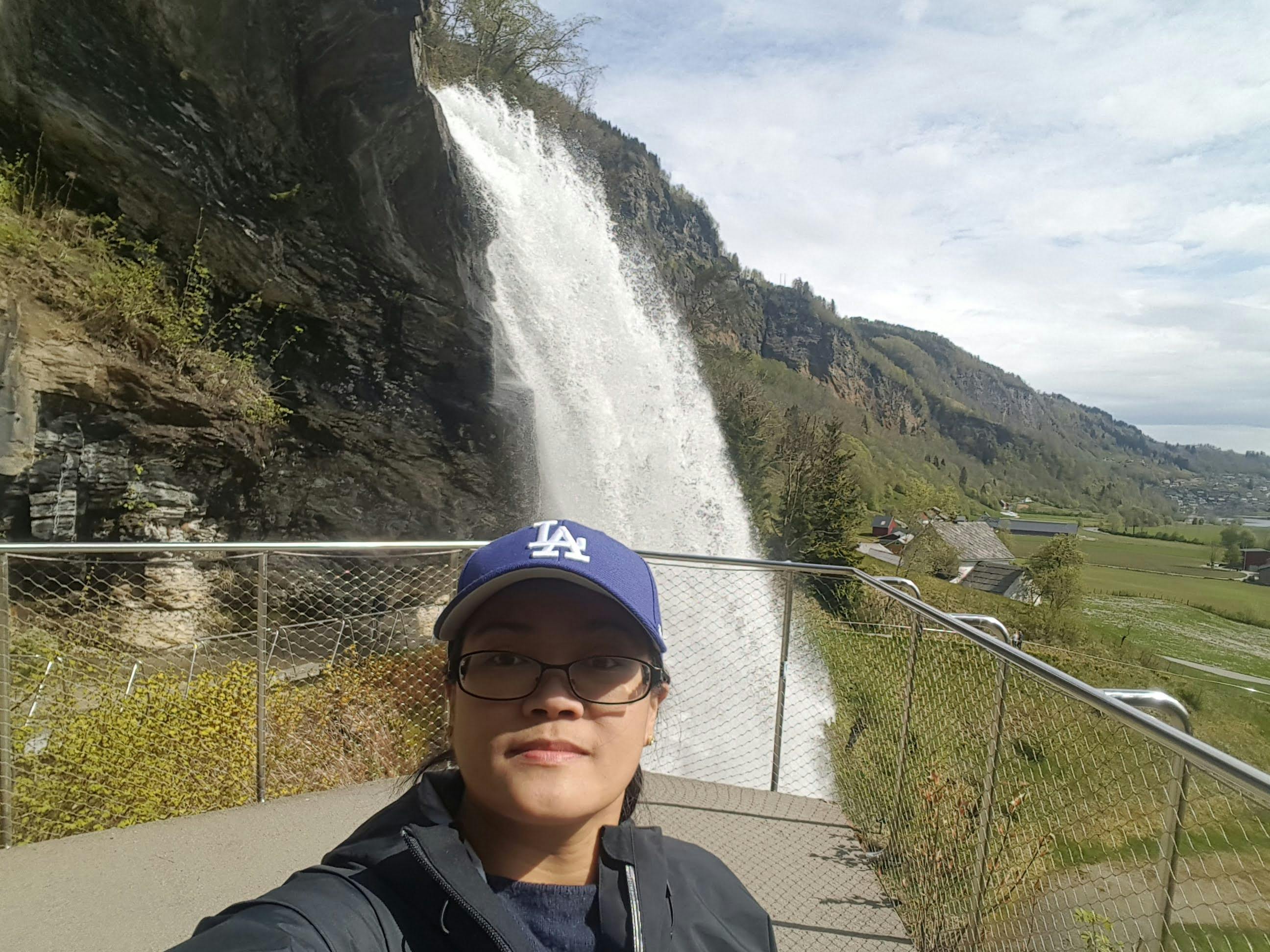 Athlete sitting on bench holding their knee, symbolizing injury management