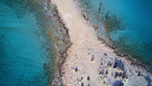 Stunning aerial shot of Simos Beach with turquoise waters and white sand, Elafonisos, Greece.