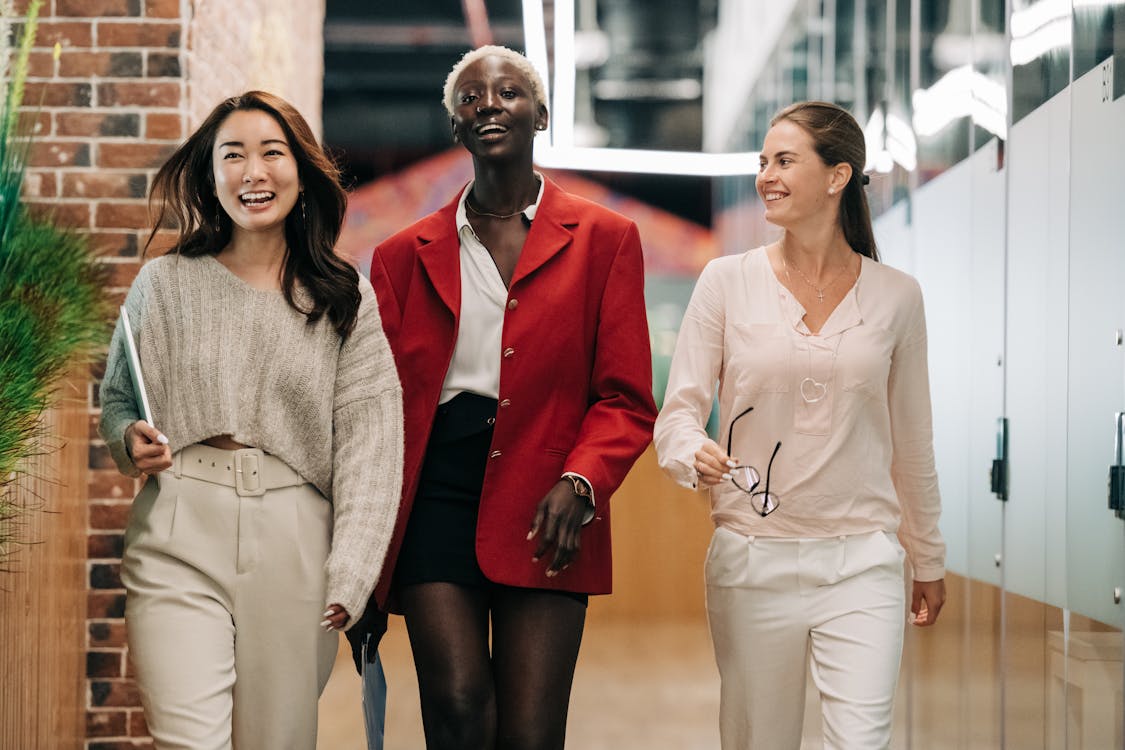 Free Successful multiethnic business colleagues in modern office Stock Photo