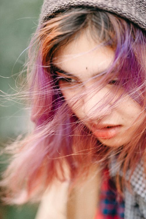 A Close-Up Shot of a Woman with Dyed Hair