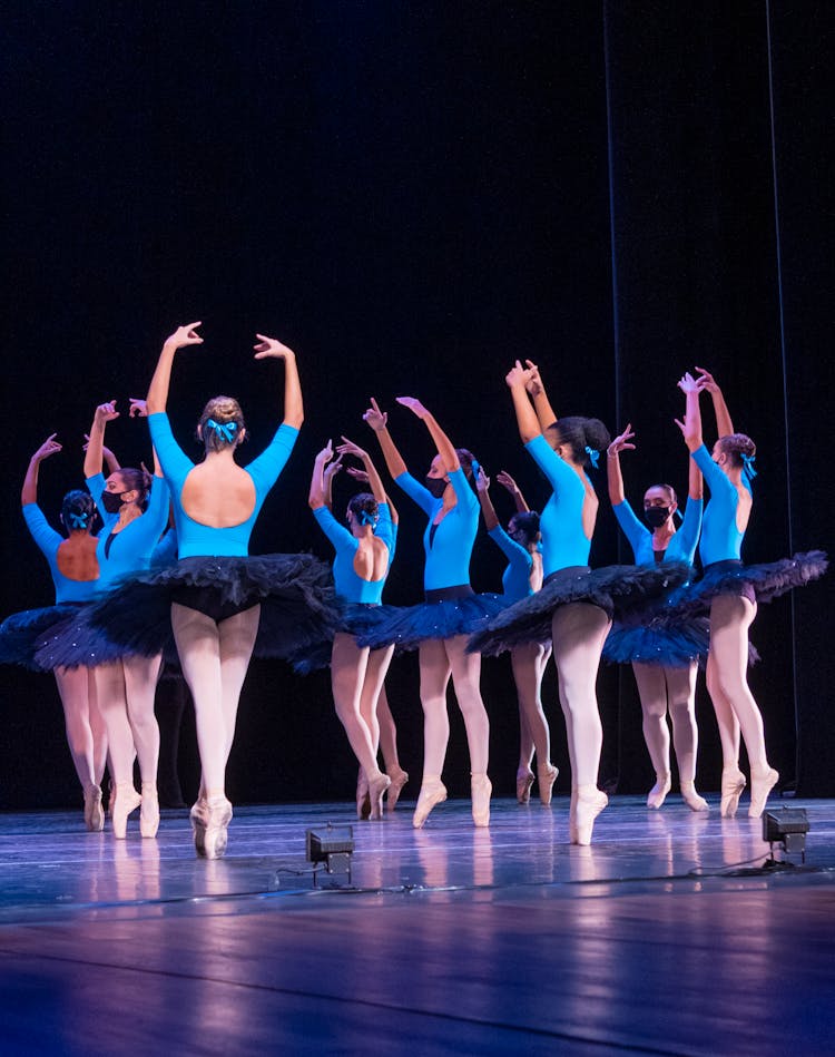 Ballerinas Dancing On A Stage