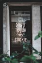 Exterior of restaurant with signboard do not touch my cookie