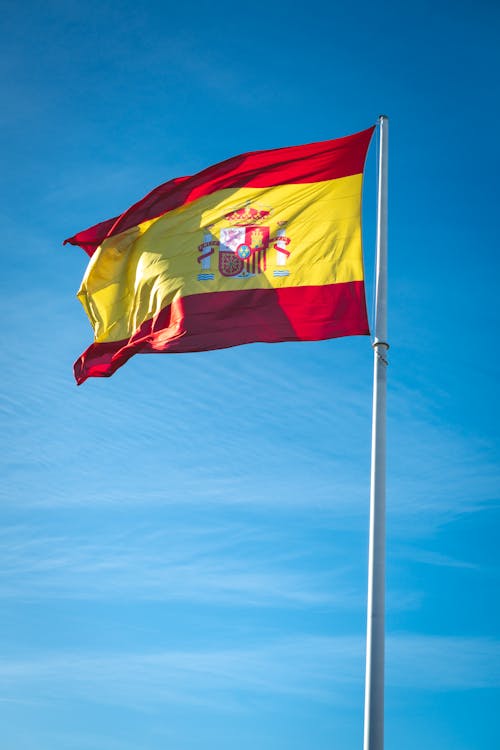 Free The Spanish Flag on the Flag Pole Stock Photo