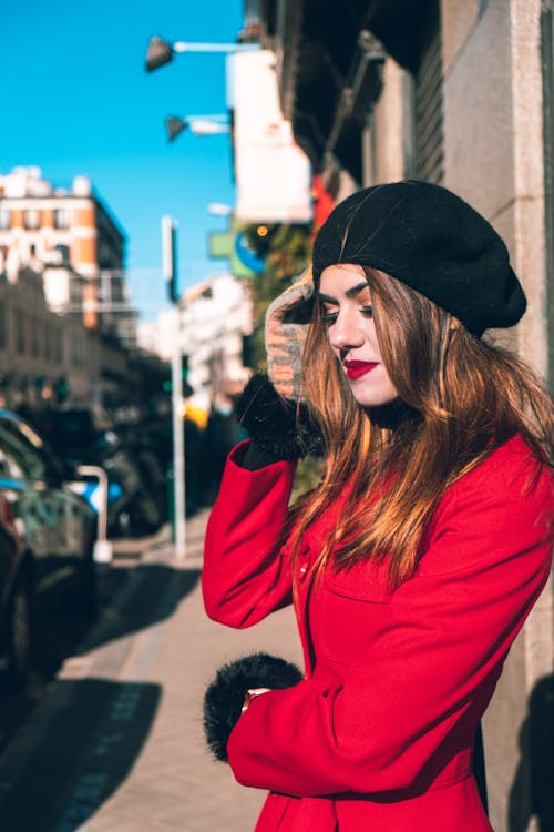 A Woman Wearing Black Beret Hat