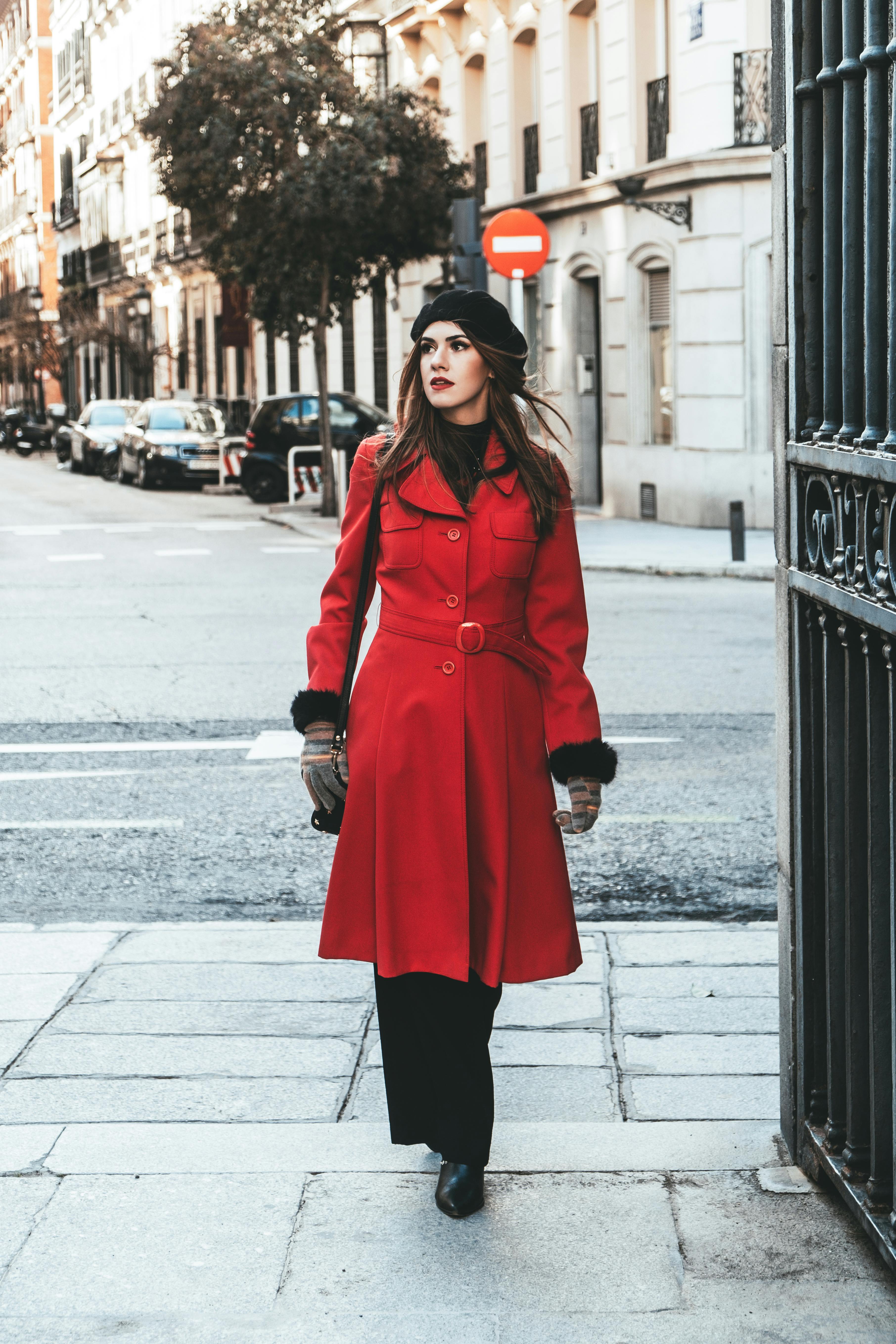 a woman wearing red coat
