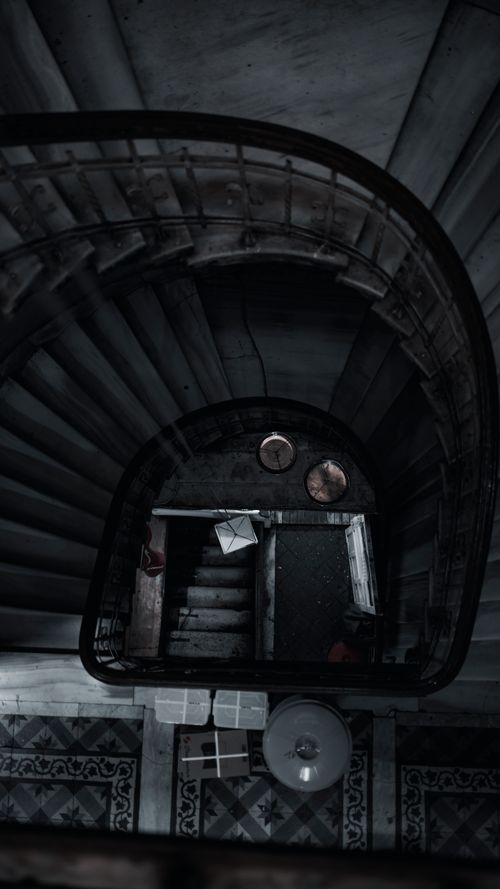 Free Top view of long spiral aged staircase of shabby old building in daytime Stock Photo