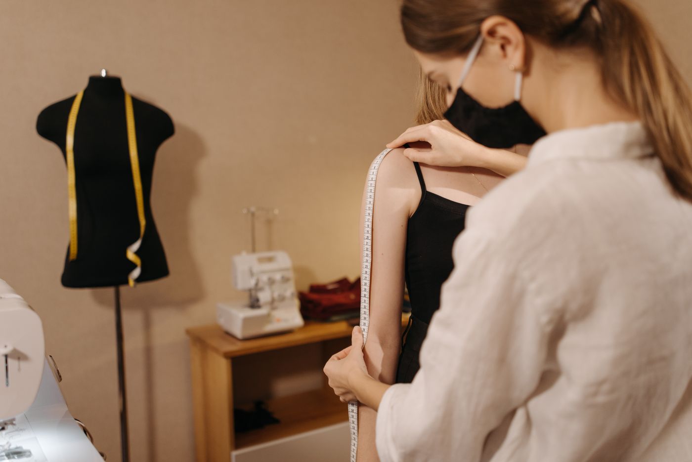 Fitting a silk editorial gown in the studio