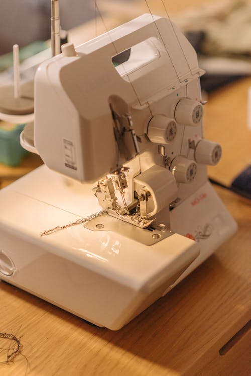 Close-Up Photo of a White Sewing Machine