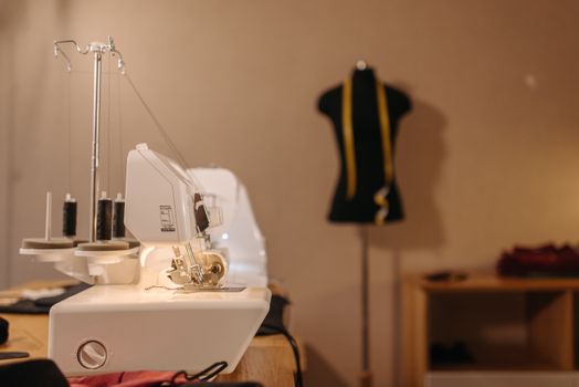 Sewing Machine on Wooden Table Photo
