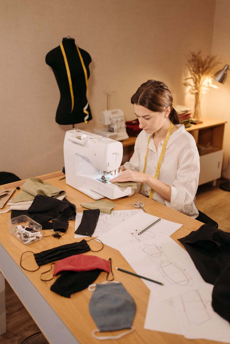 A Woman Using Sewing Machine